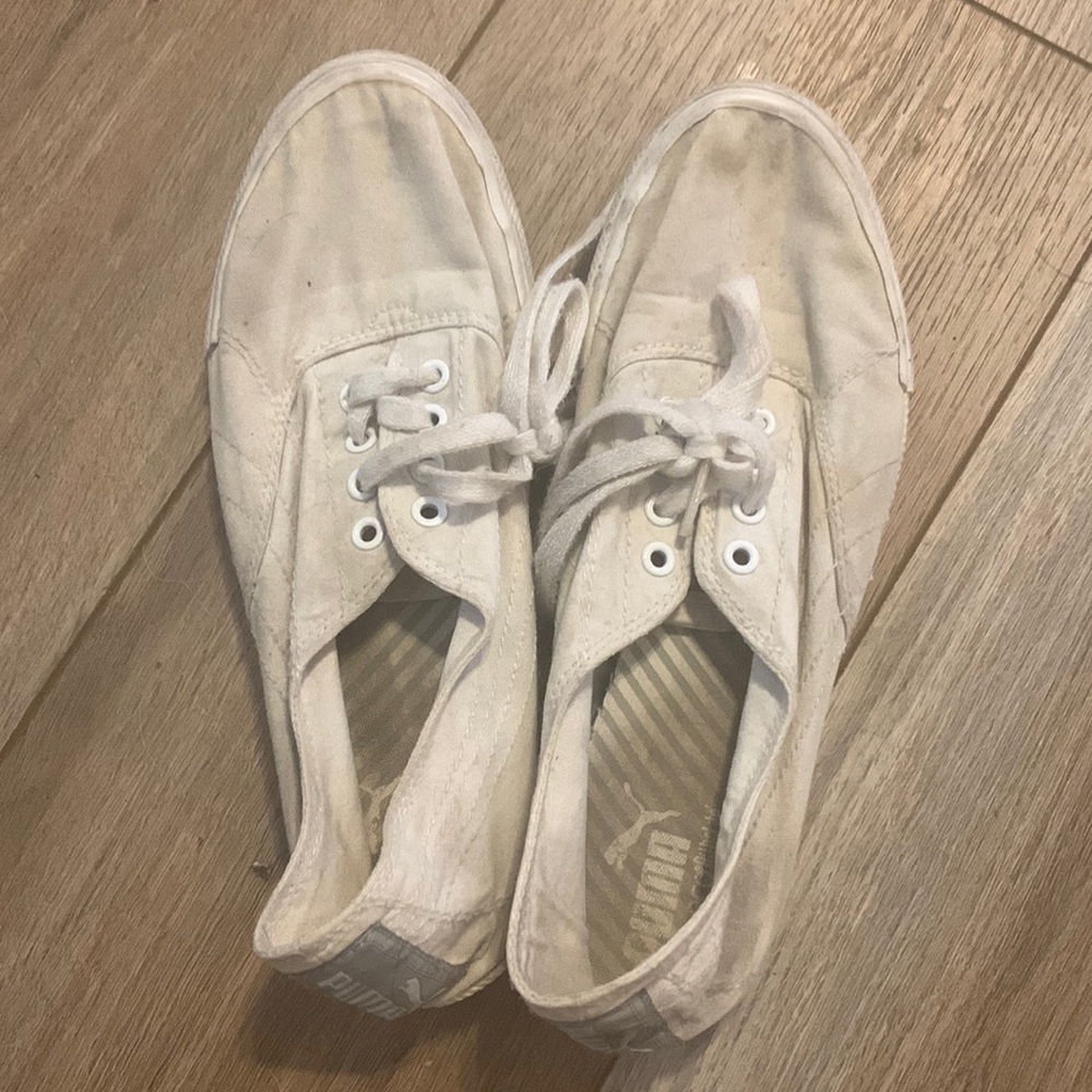 Worn well loved tennis shoes
